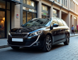 Peugeot 308 SW moderne en ville avec architecture contemporaine